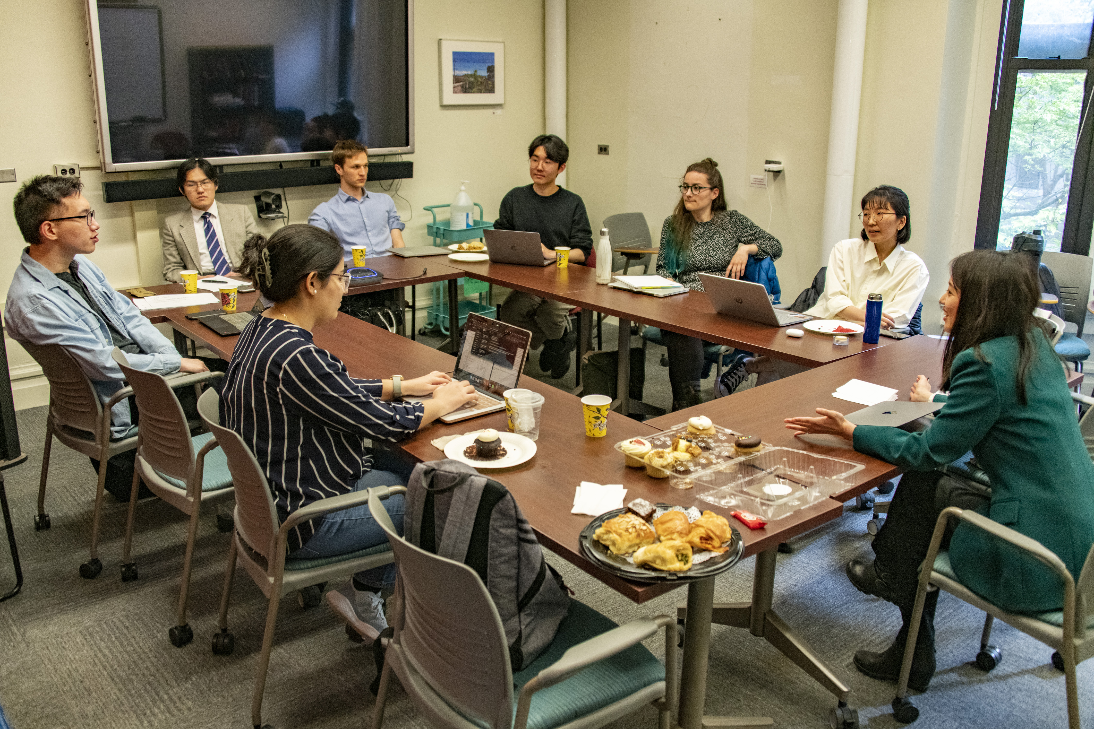6_prof_linda_zhao_leads_a_discussion_with_phd_students.jpg discussion-section