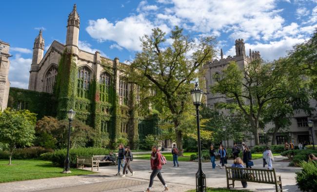 students walking in the harper quadrangle